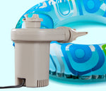 Electric pump with attached adatper and blow up pool toy