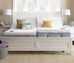 Split king Adjustable Power Base 3 with two twin XL mattresses  and wireless hand controls in a pretty white bed frame