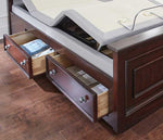 Boyd adjustable power base 6 with legs removed sitting a drawer platform bed frame with the drawers open