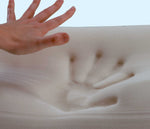hand making handprint in memory foam