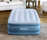 Twin Size Beautyrest Sensa-Rest air mattress head on angle in bright living room setting